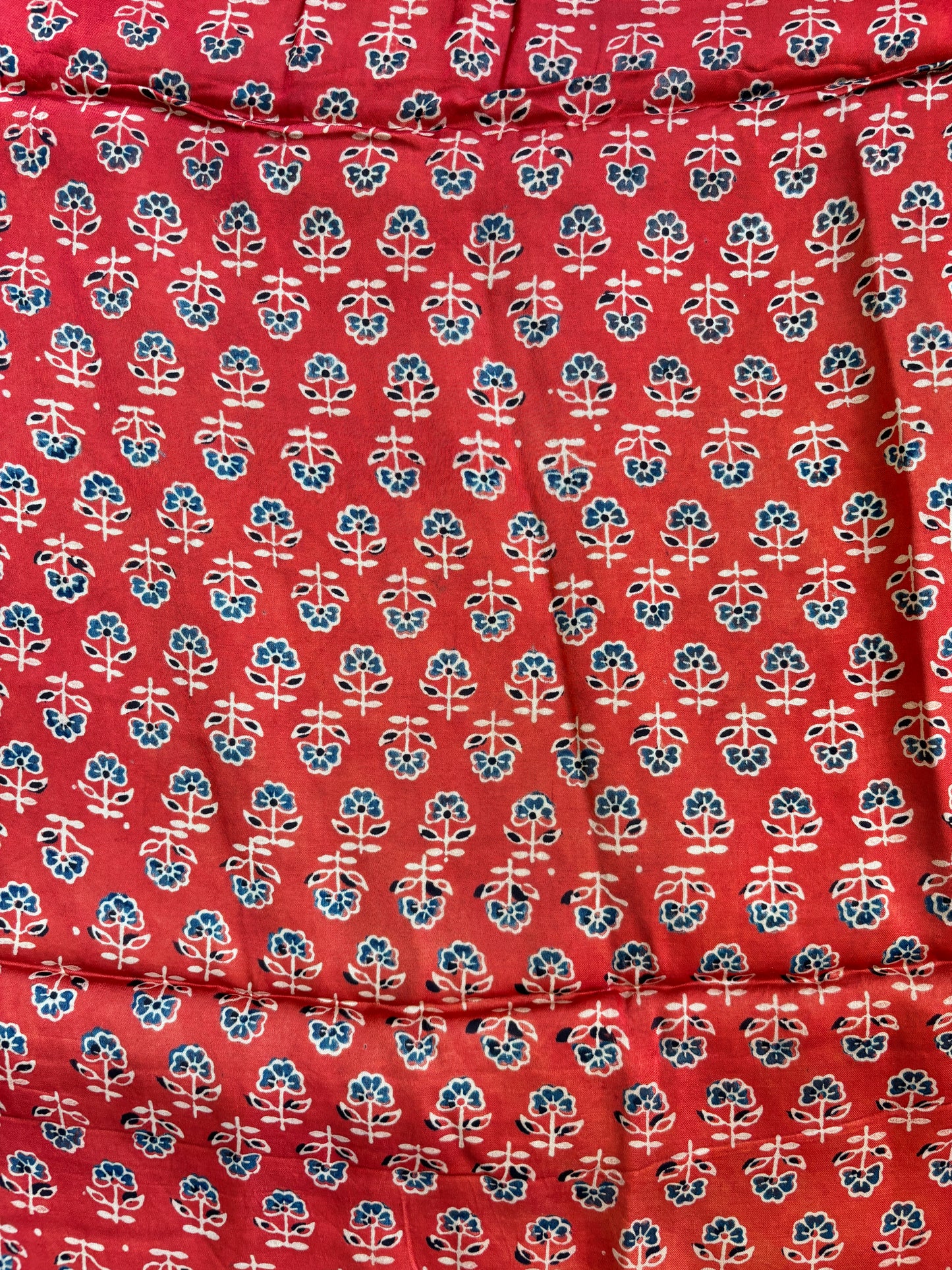 Red small Floral Motif Modal Fabric, closer view.