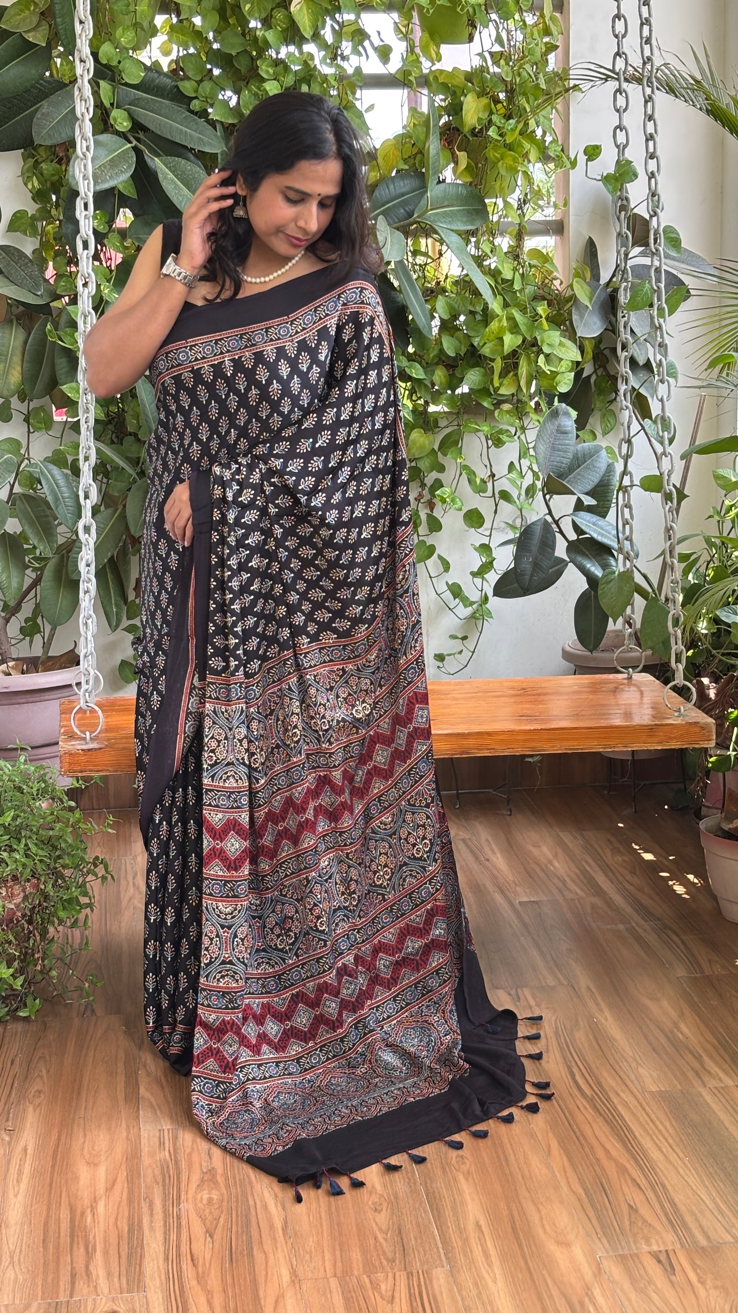 Awanti- Natural Dyed Black Colour Ajrakh Modal Saree with Small Floral Motifs
