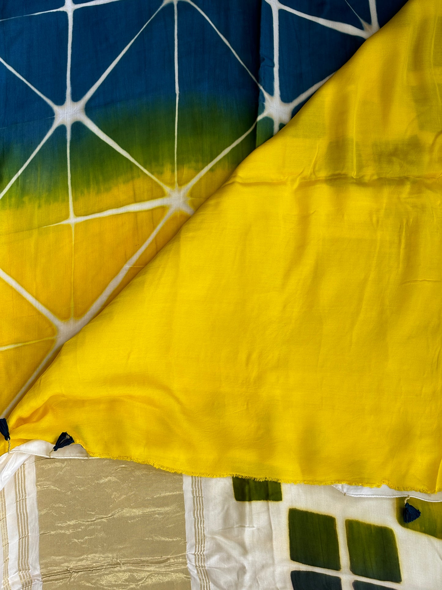 yellow blouse piece, clamp dye modal tissue saree,
pure modal saree, blouse view.