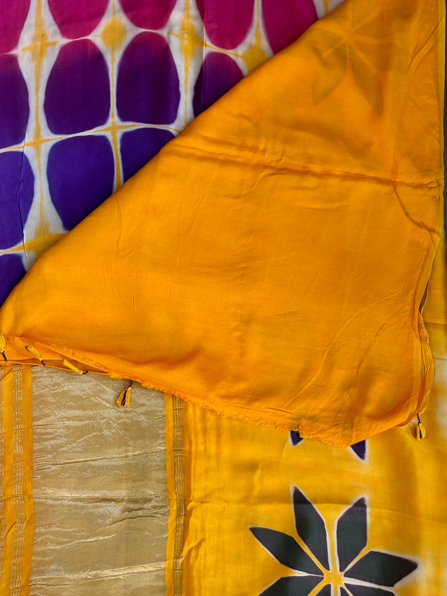 yellow clamp dye saree, with tissue saree, blouse view.