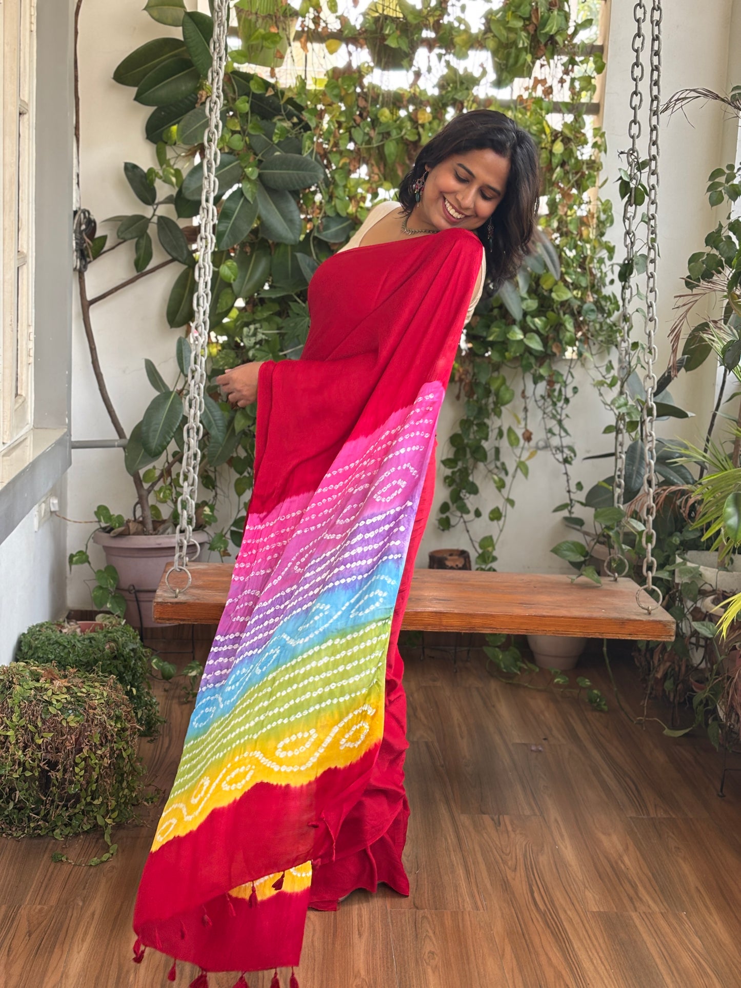 Red Solid Colour Semi Modal Saree with Multi Colour Bandhej Palla