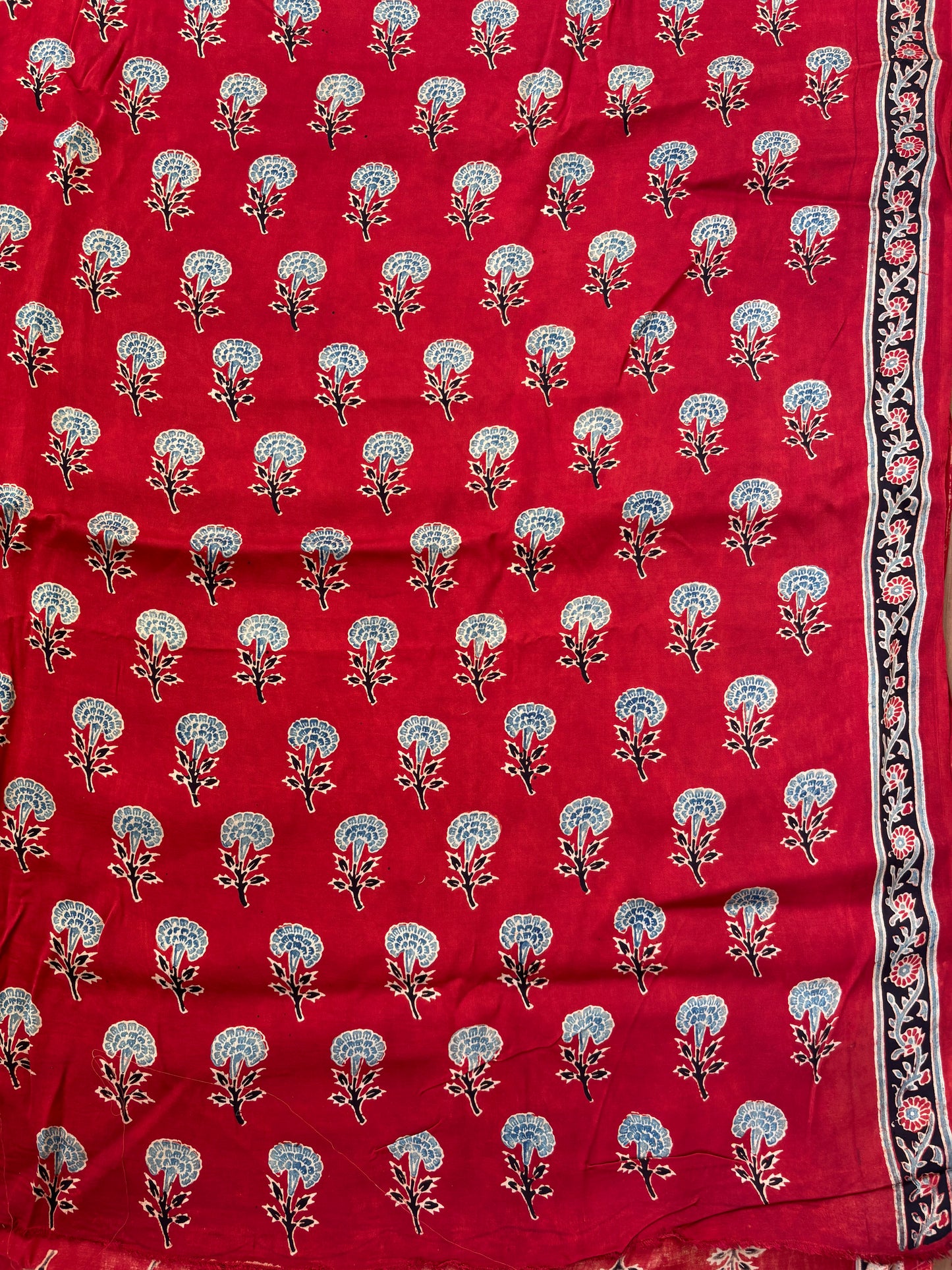 red ajrakh modal fabric, blouse piece fabric, closer view.