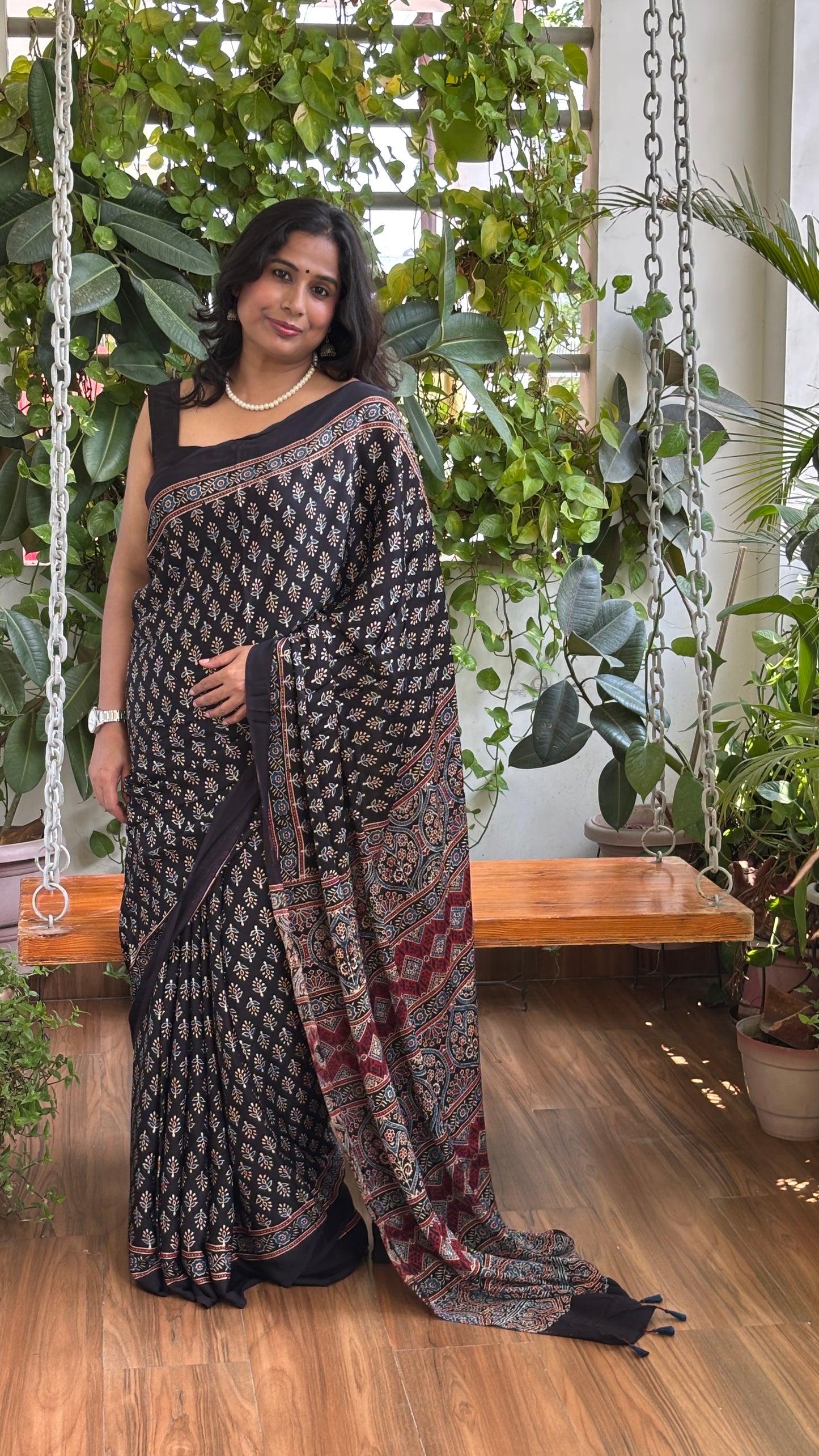 Awanti- Natural Dyed Black Colour Ajrakh Modal Saree with Small Floral Motifs