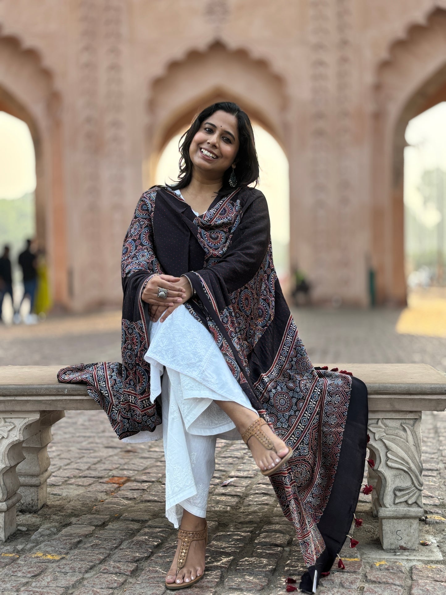 ajrakh modal black dupatta,contemporary dupatta,sitting  view.
