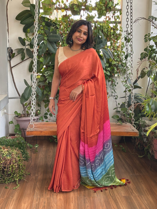 Brownish Orange Solid Colour  Semi Modal Saree with Multi Colour Bandhej Palla