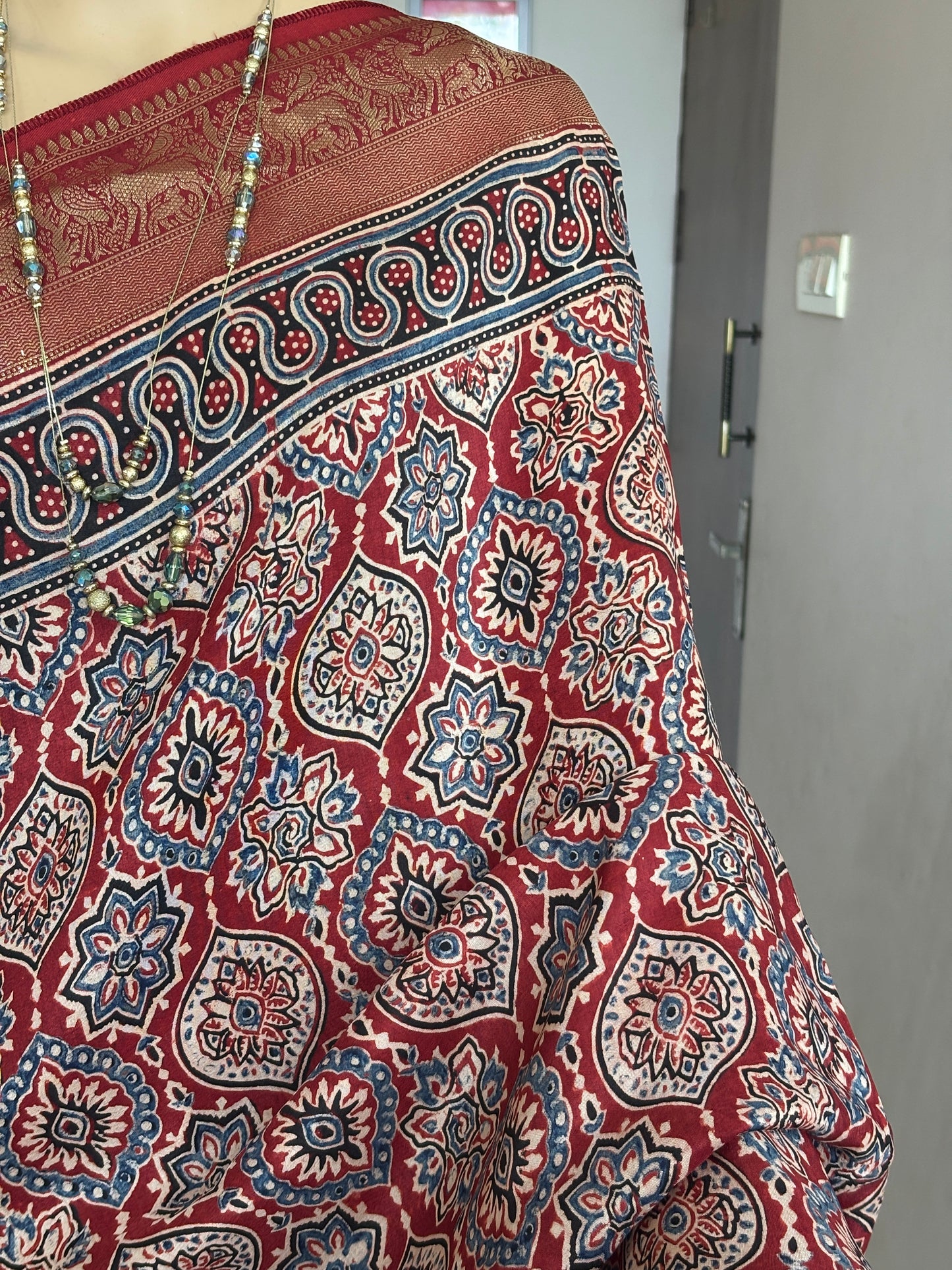 Madder Red Ajrakh Hand Block Printed Badambuta Dola Silk Saree