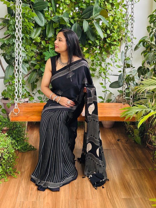 Black ajrakh saree, pure modal,sitting view.