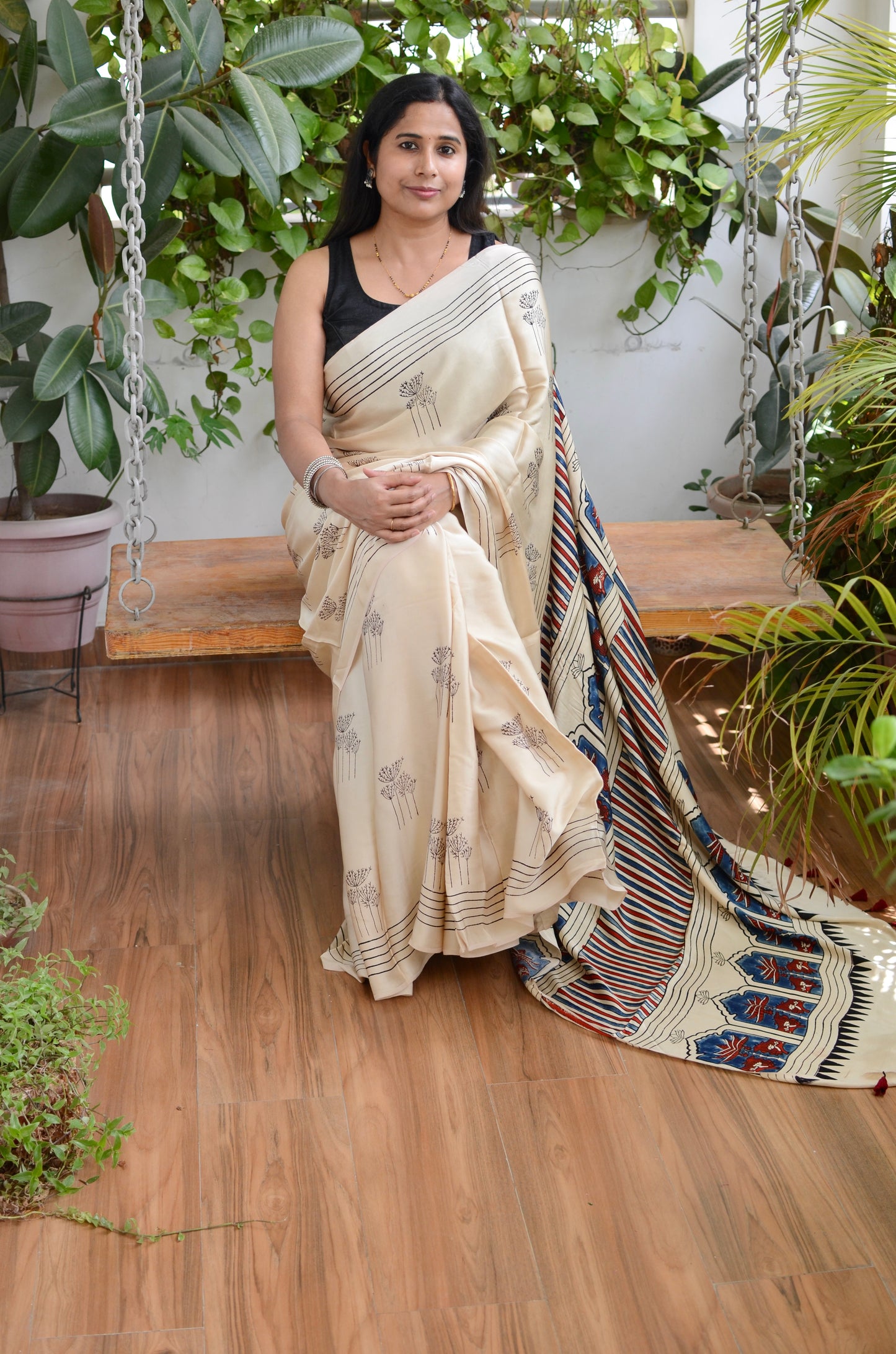 Subhra- Plale White Modal Saree with Black Motif on Body and Indigo Jharokha Motif Palla